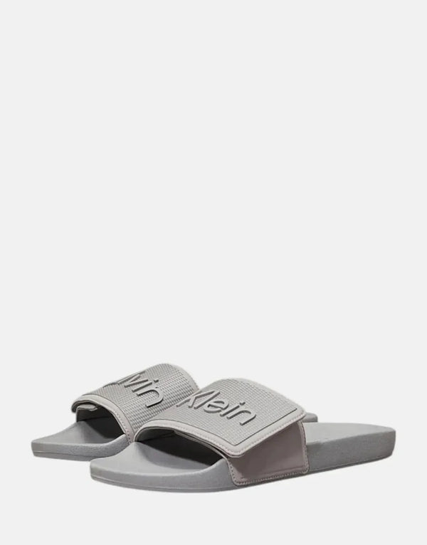 Calvin Klein Adjustable Grey Pool Slides: Comfortable, Recycled Polyester, Ergonomic Footbed
