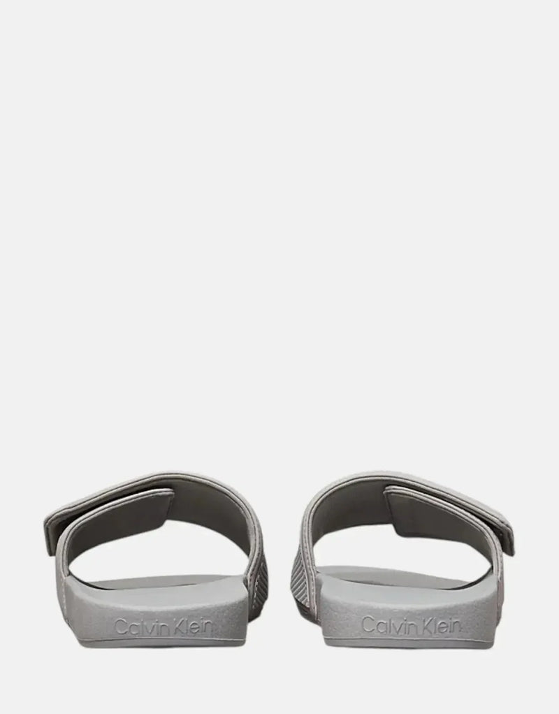 Calvin Klein Adjustable Grey Pool Slides: Comfortable, Recycled Polyester, Ergonomic Footbed