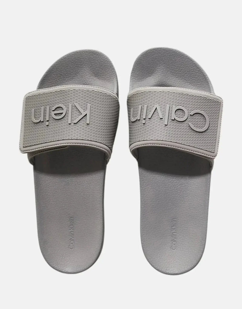 Calvin Klein Adjustable Grey Pool Slides: Comfortable, Recycled Polyester, Ergonomic Footbed