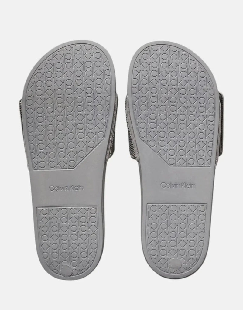 Calvin Klein Adjustable Grey Pool Slides: Comfortable, Recycled Polyester, Ergonomic Footbed