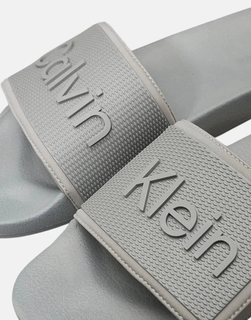 Calvin Klein Adjustable Grey Pool Slides: Comfortable, Recycled Polyester, Ergonomic Footbed