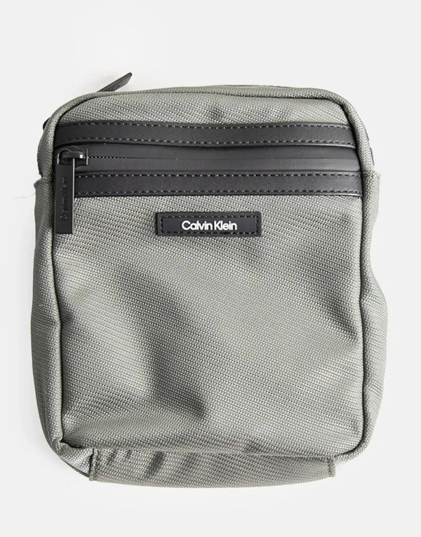 Calvin Klein Essential Reporter Bag: Compact, Stylish, Versatile Crossbody for Essentials