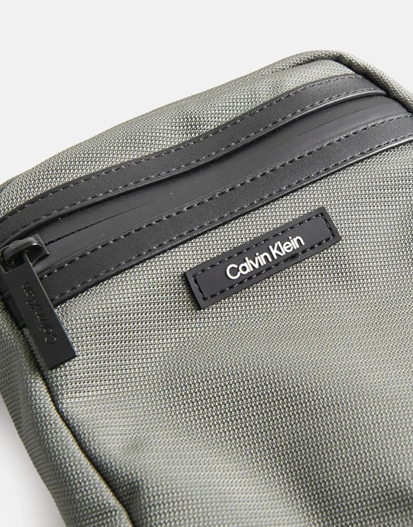 Calvin Klein Essential Reporter Bag: Compact, Stylish, Versatile Crossbody for Essentials