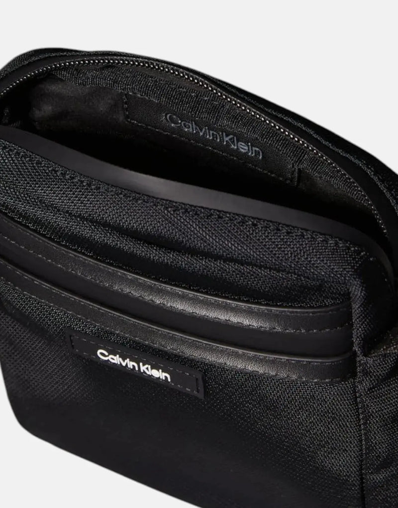 Calvin Klein Essential Reporter Bag: Sleek Black Crossbody for Daily Essentials