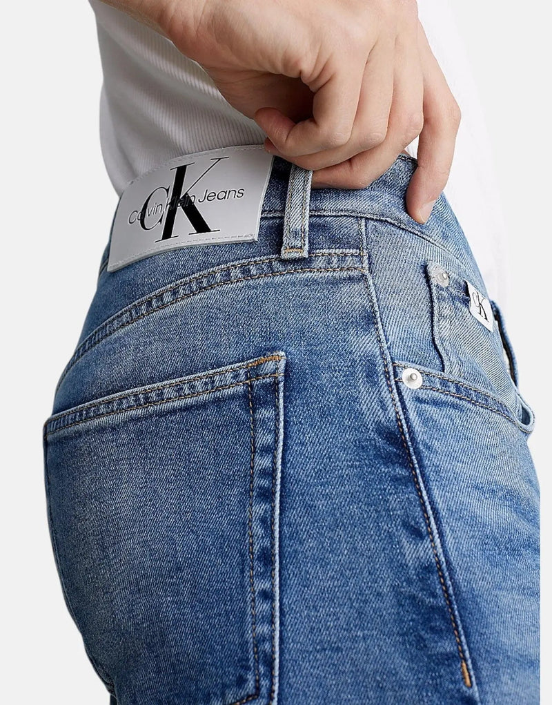 Calvin Klein Men's Comfort Stretch Slim Tapered Medium Blue Denim Jeans