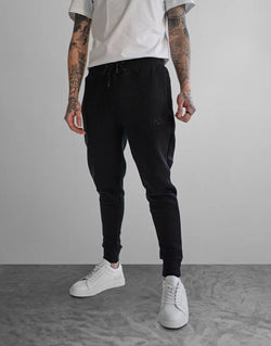Fade Essential Black Sweatpants: Premium Stretch Cotton, Slim Tapered, Cuffed Comfort