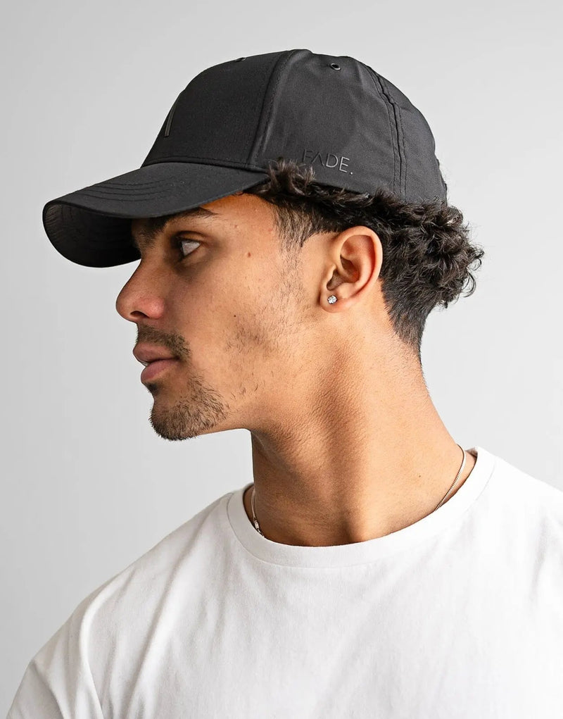 Fade Iconic Black Cap: Breathable Polyester, Comfort Fit, 3D Logo, Matte Accents