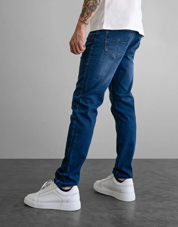 Fade Iconic Flow Blue Jeans: Slim Fit, Super Stretch Denim, Gel Pulse Pocket