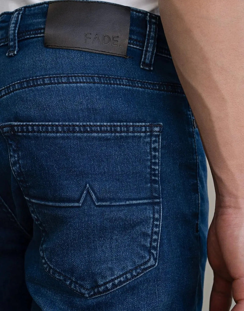 Fade Iconic Flow Blue Jeans: Slim Fit, Super Stretch Denim, Gel Pulse Pocket