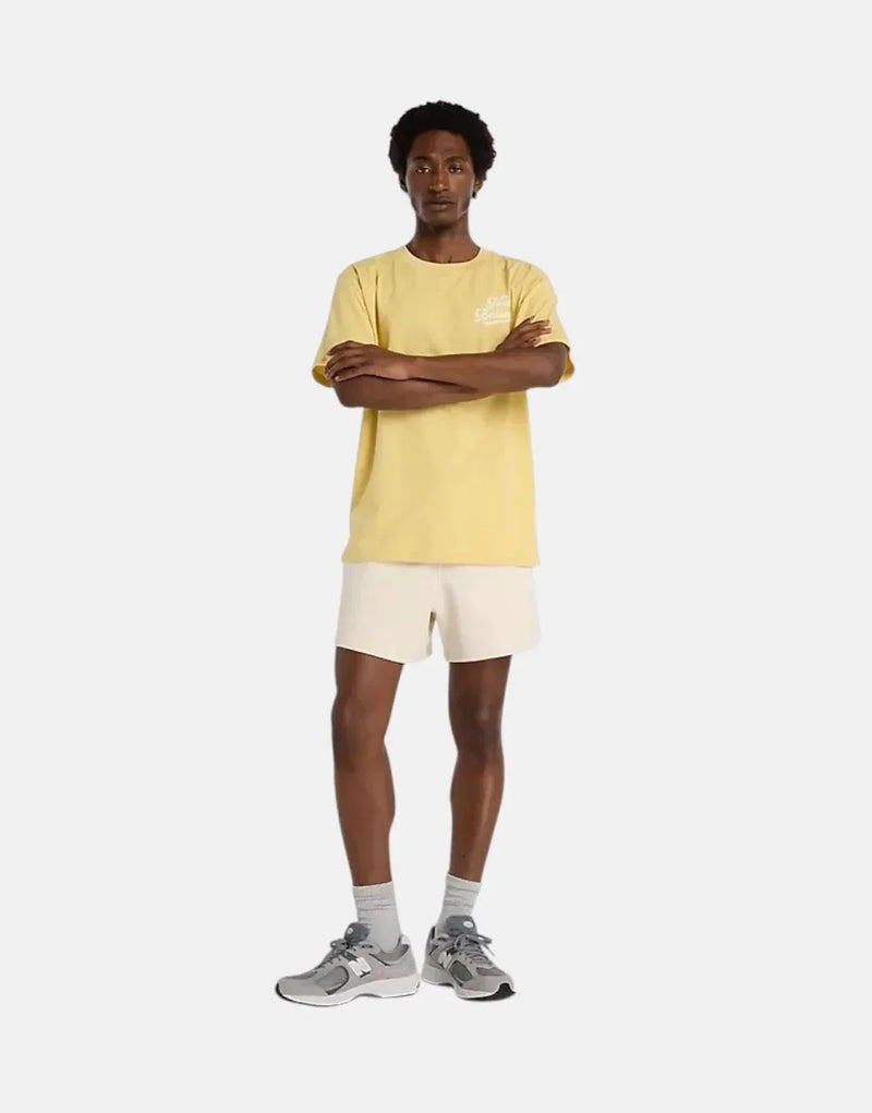 New Balance Athletics Legacy Hay Yellow T-Shirt: Relaxed Fit, 100% Cotton Comfort